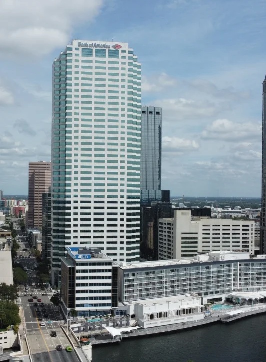 Professional lightning protection system installed on modern bank building with air terminals and down conductors