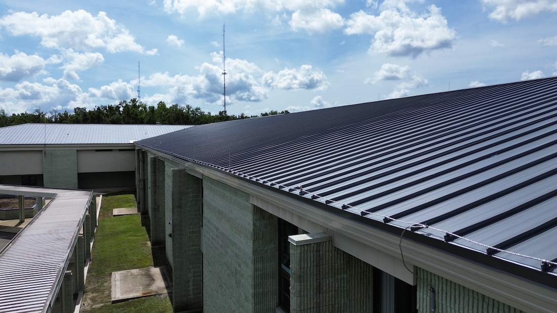 industrial lightning protection installation air terminals and down conductors on manufacturing plant facility