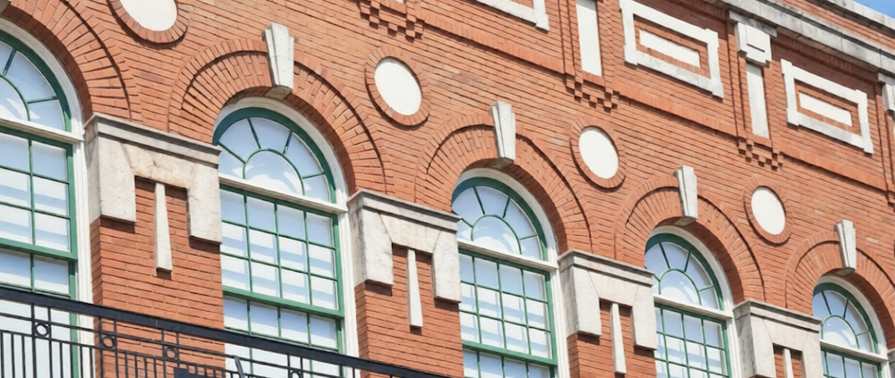 retrofit lightning protection system installation on older commercial building roofline