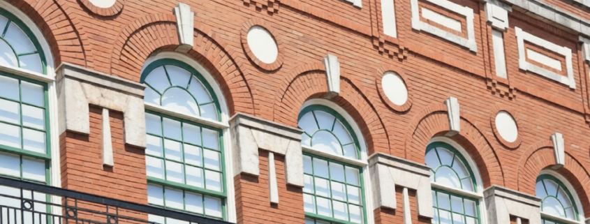 retrofit lightning protection system installation on older commercial building roofline