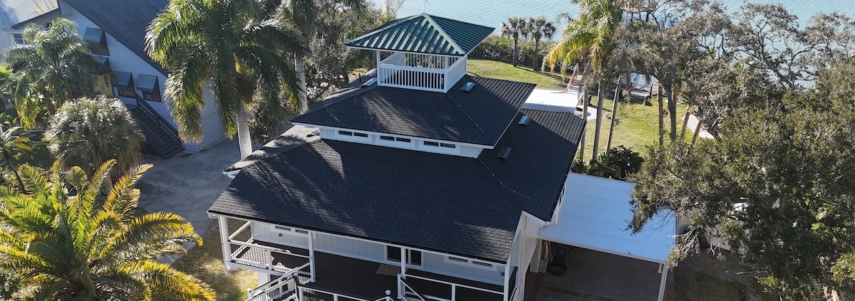 Waterfront Jacksonville home with lightning protection air terminals installed on roof ridge