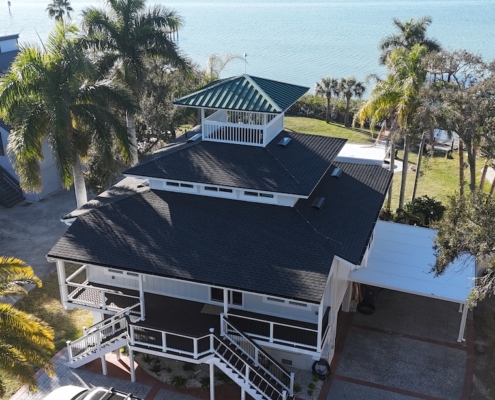 Waterfront Jacksonville home with lightning protection air terminals installed on roof ridge