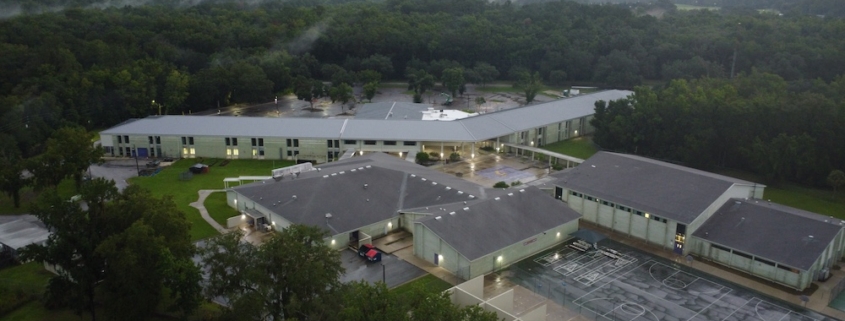 Commercial building with lightning protection system installed on roof in Florida